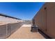 Low maintenance backyard with gravel and block wall providing privacy for the property at 11275 N 99Th Ave # 1, Peoria, AZ 85345