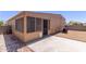 Enclosed back porch and patio with a low-maintenance yard at 11275 N 99Th Ave # 1, Peoria, AZ 85345