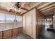 Enclosed porch with ceiling fan has views of the desert and a storage closet at 11275 N 99Th Ave # 1, Peoria, AZ 85345