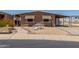 Cozy single story home with awnings and a covered carport is move-in ready at 11275 N 99Th Ave # 1, Peoria, AZ 85345