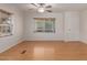 Bright, neutral living room features light-colored floors and natural light at 11275 N 99Th Ave # 1, Peoria, AZ 85345