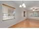 Bright, neutral living room features light-colored floors and natural light at 11275 N 99Th Ave # 1, Peoria, AZ 85345