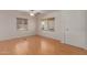 Bright, neutral living room features light-colored floors and natural light at 11275 N 99Th Ave # 1, Peoria, AZ 85345