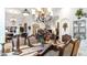 Elegant dining room with decorative chandelier, formal seating, and open floor plan at 11307 E Elmhurst Dr, Chandler, AZ 85249