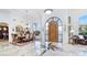 Formal dining room with a table set for ten under an elegant chandelier at 11307 E Elmhurst Dr, Chandler, AZ 85249