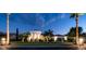 An exterior view of the property showcases professional landscaping and elegant architecture at 11307 E Elmhurst Dr, Chandler, AZ 85249