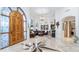 Spacious foyer with marble floors, statement chandelier, and views of the living room at 11307 E Elmhurst Dr, Chandler, AZ 85249