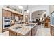 Beautiful kitchen featuring an oversized island with seating and stainless steel appliances at 11307 E Elmhurst Dr, Chandler, AZ 85249