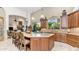 Spacious kitchen with a large island, granite countertops, and high-end appliances at 11307 E Elmhurst Dr, Chandler, AZ 85249