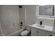 Bathroom featuring modern vanity, bathtub and shower with modern fixtures at 11342 W Barbara Ave, Peoria, AZ 85345