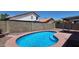 Backyard pool with stone surround, offering privacy and leisure at 11342 W Barbara Ave, Peoria, AZ 85345