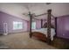 Large primary bedroom with plush carpet, ceiling fan and large windows at 11832 W Electra Ln, Sun City, AZ 85373