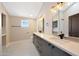 Modern bathroom features double vanity, mosaic floors, and subway tile at 12222 N 74Th St, Scottsdale, AZ 85260