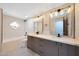 Beautiful bathroom featuring dual sinks, modern fixtures, and lots of natural light at 12222 N 74Th St, Scottsdale, AZ 85260