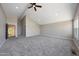 Spacious bedroom features vaulted ceiling, neutral walls, and plush carpeting at 12222 N 74Th St, Scottsdale, AZ 85260