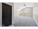 Spacious bedroom featuring large windows and plush carpeting at 12222 N 74Th St, Scottsdale, AZ 85260