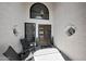 Home entryway is decorated with a mat and chairs at 12222 N 74Th St, Scottsdale, AZ 85260