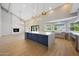 Open-concept kitchen features a large island, modern appliances, ample counter space and high ceilings at 12222 N 74Th St, Scottsdale, AZ 85260