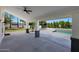 Back patio has a ceiling fan and looks out to the pool at 12222 N 74Th St, Scottsdale, AZ 85260