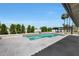 Refreshing backyard pool surrounded by lush landscaping and mature trees, ideal for relaxing or entertaining at 12222 N 74Th St, Scottsdale, AZ 85260