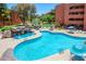 Beautiful swimming pools with waterfalls and landscaped common area at 12222 N Paradise Village S Pkwy # 220, Phoenix, AZ 85032
