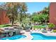 View of common area pools, golf course and clubhouse in the distance at 12222 N Paradise Village S Pkwy # 220, Phoenix, AZ 85032