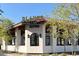 Charming restaurant exterior with rustic tile roof, decorative lighting and inviting outdoor dining area at 12222 N Paradise Village S Pkwy # 220, Phoenix, AZ 85032