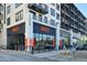 Modern retail space with vibrant signage, outdoor dining, and sleek architectural details at 12222 N Paradise Village S Pkwy # 220, Phoenix, AZ 85032