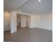 Open-concept living room featuring recessed lighting, hardwood floors, and neutral paint at 12323 W Luxton Ln, Avondale, AZ 85323