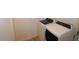 Laundry area featuring white, front-load washer and dryer machines at 12324 W Parkway Ln, Avondale, AZ 85323