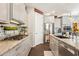 Well-equipped kitchen features sleek cabinetry, modern appliances, and stylish countertops for easy meal preparation at 13088 N 91St Dr, Peoria, AZ 85381