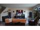 Cozy living room with large screen television, cabinets, and lamps at 1309 W Park St, Phoenix, AZ 85041