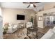 Inviting living room with wood floors, vaulted ceiling, and an open layout at 15014 N 48Th Pl, Scottsdale, AZ 85254