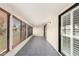 Enclosed Arizona room with tiled floor and sliding glass doors to let the outside in at 160 Leisure World -- # 160, Mesa, AZ 85206