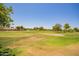 Scenic golf course view with lush green fairways and mature trees in a desirable community at 160 Leisure World -- # 160, Mesa, AZ 85206