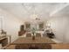Open-concept living room with stylish furnishings, hardwood floors, and plenty of natural light at 160 Leisure World -- # 160, Mesa, AZ 85206