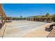 Well-maintained shuffleboard courts with covered seating provide recreational opportunities for residents at 160 Leisure World -- # 160, Mesa, AZ 85206