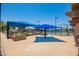 Outdoor seating area at the Leisure World Tennis Complex with covered shade at 160 Leisure World -- # 160, Mesa, AZ 85206