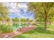 Scenic community pond with lush greenery creating a serene and picturesque environment at 1713 E Bridgeport Pkwy, Gilbert, AZ 85295