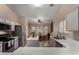 Bright kitchen with neutral paint, stainless steel appliances and center island at 1719 E Sandalwood Rd, Casa Grande, AZ 85122