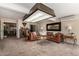 Cozy living room with a large sectional sofa, neutral palette, and stylish decor at 1719 E Sandalwood Rd, Casa Grande, AZ 85122