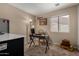 Office with a desk, chair, vintage suitcases, and a bright window at 1719 E Sandalwood Rd, Casa Grande, AZ 85122