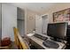 Office with a desk, rolling chair, and ample lighting at 1719 E Sandalwood Rd, Casa Grande, AZ 85122