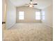 Spacious bedroom with natural light and vaulted ceilings at 1902 N 106Th Ave, Avondale, AZ 85392