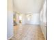Bright living room featuring tile flooring, neutral walls, and stairway to the second floor at 1902 N 106Th Ave, Avondale, AZ 85392