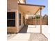 Covered patio with ceiling fan, concrete flooring, and views of the fenced yard at 1902 N 106Th Ave, Avondale, AZ 85392