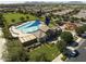 An aerial view of the community pool, clubhouse, playground and landscaping at 20269 E Hummingbird Dr, Queen Creek, AZ 85142
