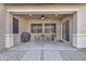 Covered patio with ceiling fan, outdoor seating, and a view of the landscaped backyard at 20269 E Hummingbird Dr, Queen Creek, AZ 85142