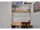 A well lit desk nook features a butcher block desktop and bright white walls at 20269 E Hummingbird Dr, Queen Creek, AZ 85142