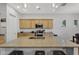 Bright kitchen featuring granite countertops, stainless appliances, and an island with barstool seating at 20269 E Hummingbird Dr, Queen Creek, AZ 85142